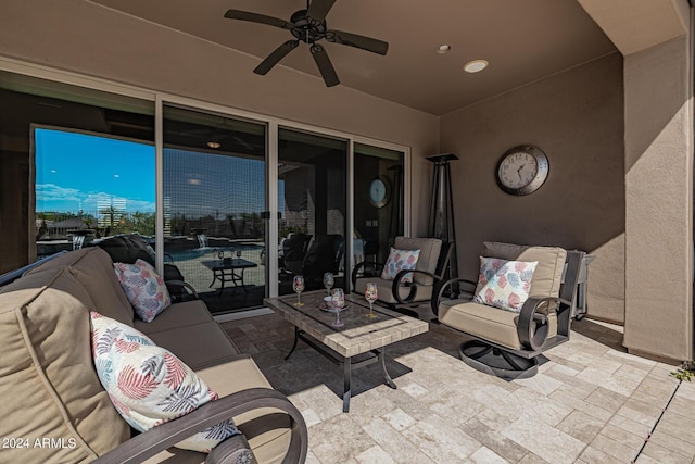 view of patio featuring ceiling fan and an outdoor hangout area