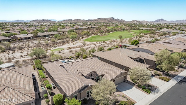 birds eye view of property featuring a mountain view