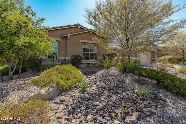 view of front of property featuring a garage