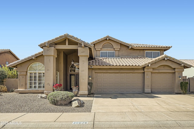 view of front of property featuring a garage