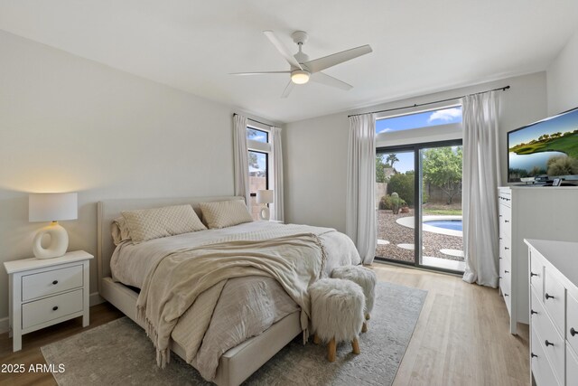 19203 N 39th Way, Phoenix, AZ 85050 - bedroom featuring a ceiling fan, access to exterior, multiple windows, and light wood finished floors