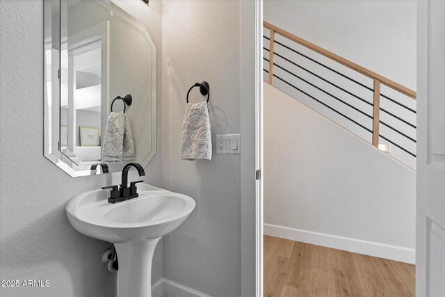 19203 N 39th Way, Phoenix, AZ 85050 - bathroom with baseboards and wood finished floors
