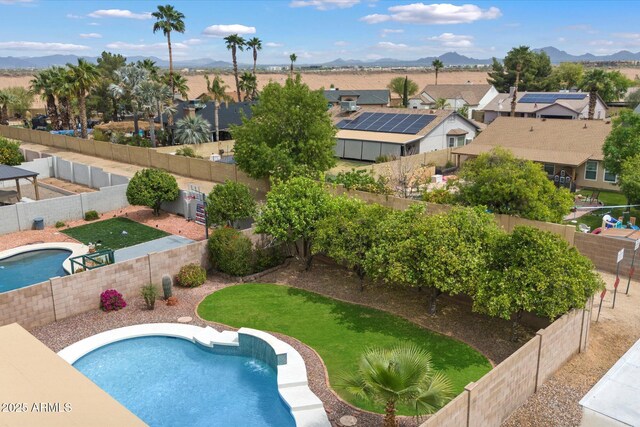19203 N 39th Way, Phoenix, AZ 85050 - view of swimming pool featuring a mountain view, a fenced backyard, a fenced in pool, and a residential view