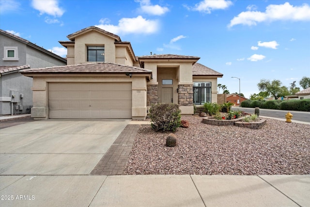 19203 N 39th Way, Phoenix, AZ 85050 - view of front of house with an attached garage, driveway, stucco siding, and stone siding