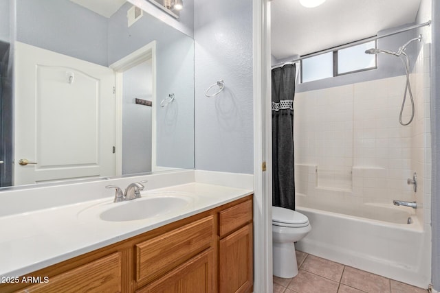 full bathroom featuring vanity, shower / bath combo, tile patterned flooring, and toilet