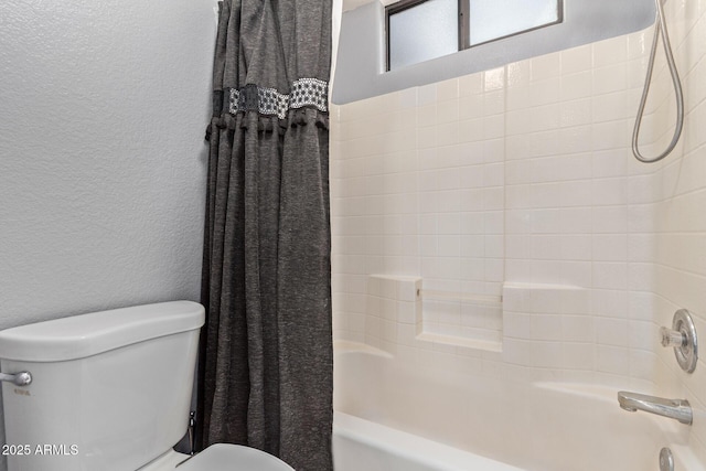 bathroom featuring toilet, shower / bath combination with curtain, and a textured wall