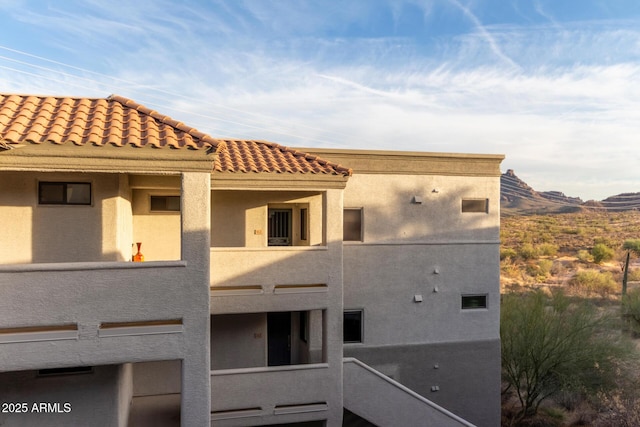 view of building exterior featuring a mountain view