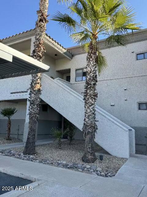 view of home's exterior with stucco siding