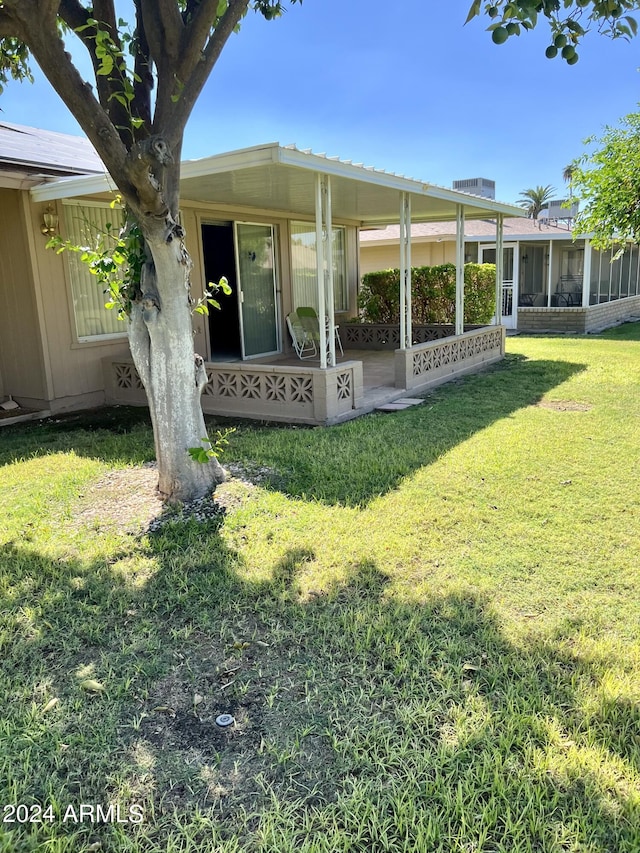 exterior space featuring a lawn
