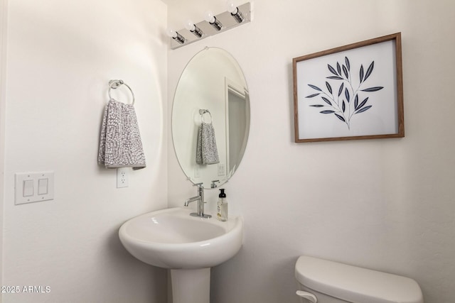 1879 W 23rd Ave, Apache Junction, AZ 85120 - bathroom with toilet and a sink