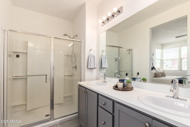 1879 W 23rd Ave, Apache Junction, AZ 85120 - ensuite bathroom featuring a shower stall and double vanity