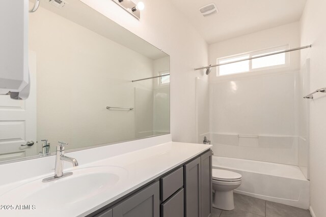 1879 W 23rd Ave, Apache Junction, AZ 85120 - full bath featuring vanity, toilet, tile patterned floors, and  shower combination