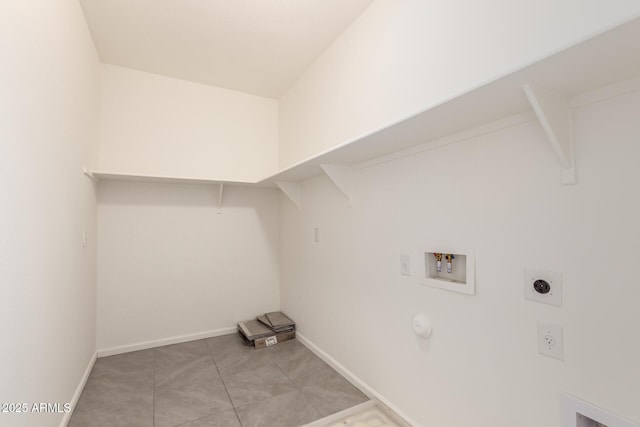 1879 W 23rd Ave, Apache Junction, AZ 85120 - washroom with hookup for a washing machine, electric dryer hookup, baseboards, light tile patterned floors, and hookup for a gas dryer
