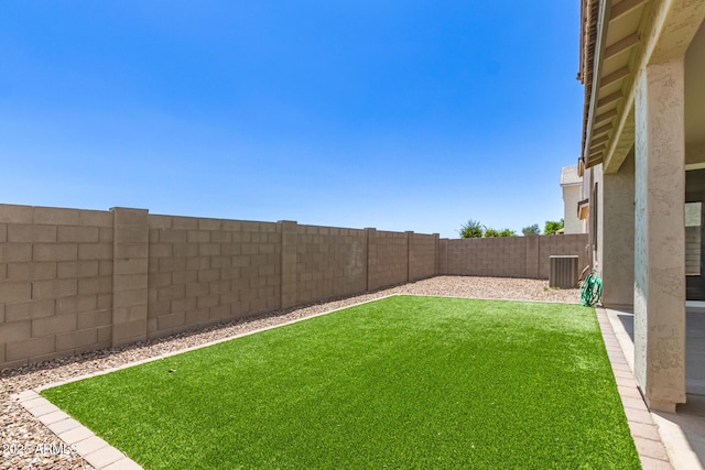 1879 W 23rd Ave, Apache Junction, AZ 85120 - view of yard with central AC unit