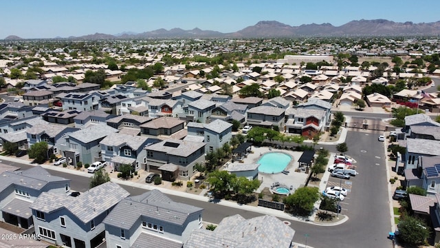 1879 W 23rd Ave, Apache Junction, AZ 85120 - aerial perspective of suburban area with a mountain backdrop and a pool area