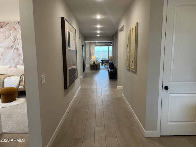 corridor featuring light hardwood / wood-style flooring