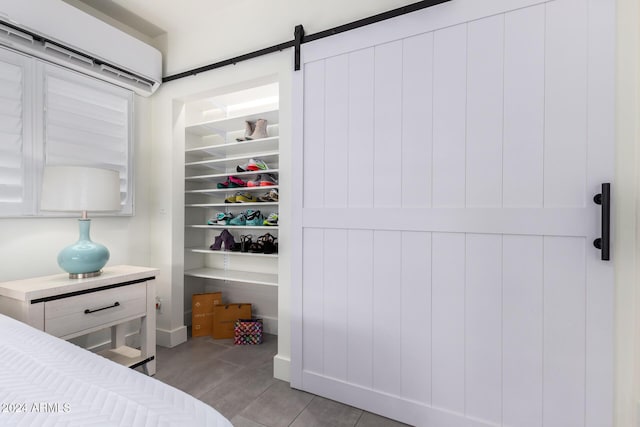 bedroom with a barn door