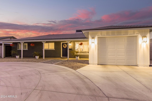 view of front of home with a garage