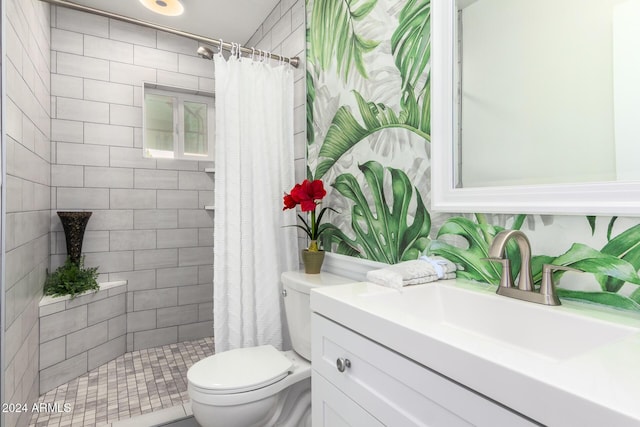 bathroom with a shower with shower curtain, vanity, and toilet