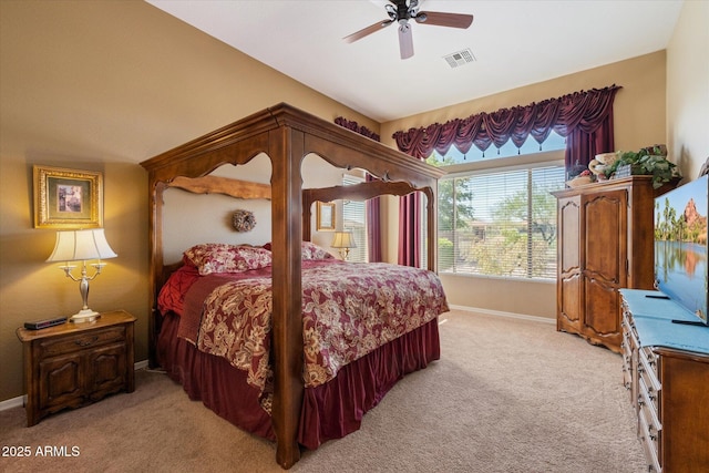bedroom with light carpet, baseboards, visible vents, and a ceiling fan