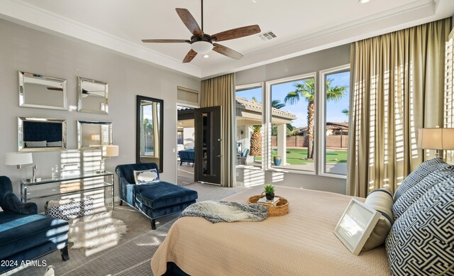 carpeted bedroom featuring access to outside, ornamental molding, and visible vents