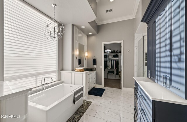 bathroom featuring a chandelier, visible vents, marble finish floor, ornamental molding, and a tub