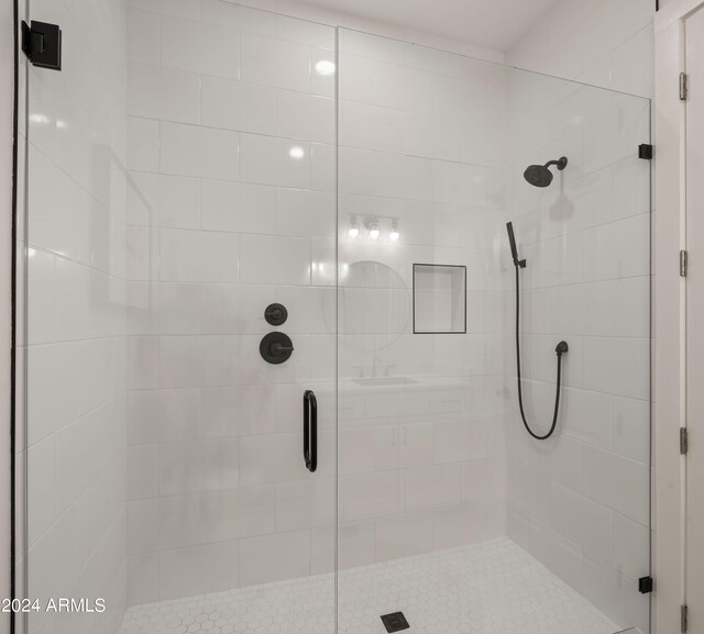 bathroom with a stall shower