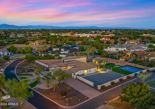 birds eye view of property with a residential view and a mountain view