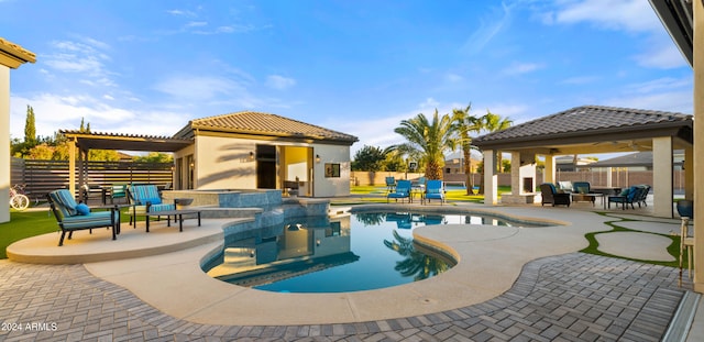 view of pool with ceiling fan, a patio, a fenced backyard, and a fenced in pool