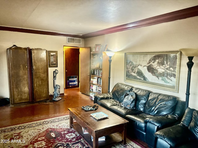 living area with visible vents, crown molding, and wood finished floors