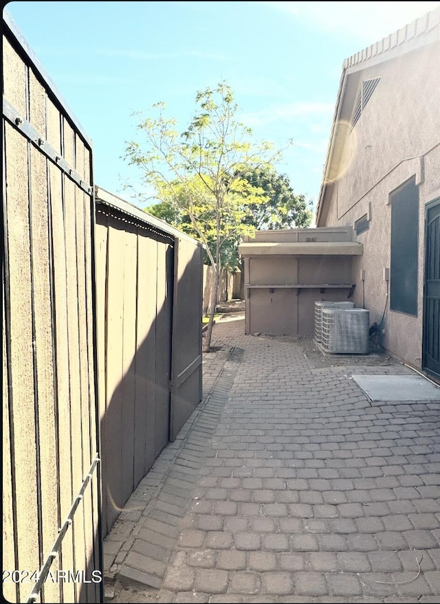 view of patio / terrace with central air condition unit