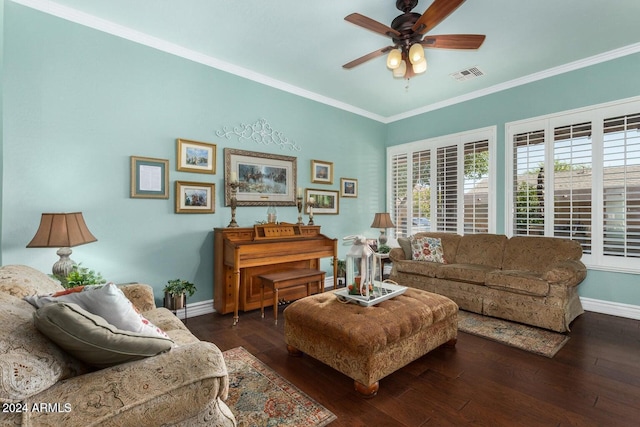 living room featuring ceiling fan, dark hardwood / wood-style flooring, and ornamental molding