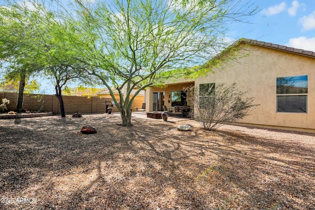 view of yard with a patio and fence