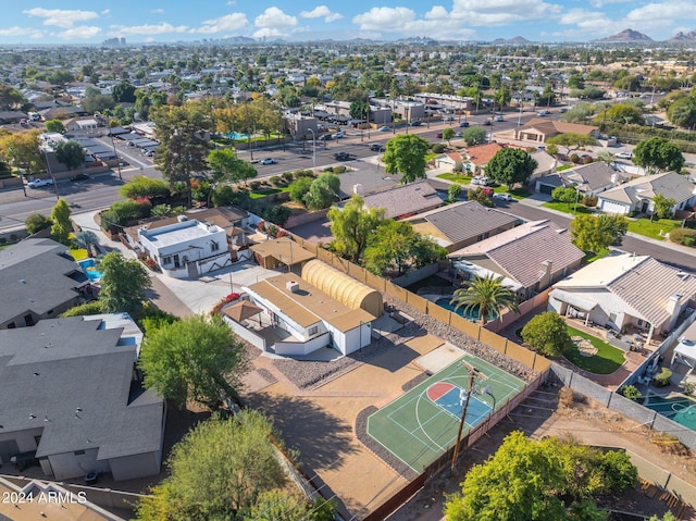 birds eye view of property featuring a mountain view