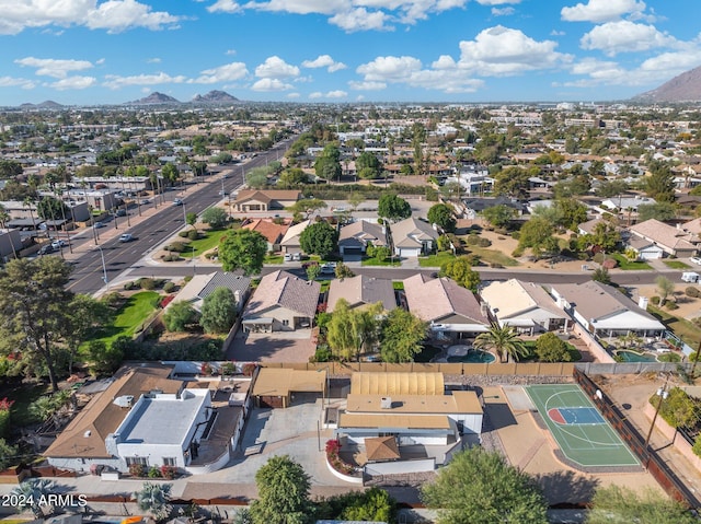 birds eye view of property featuring a mountain view