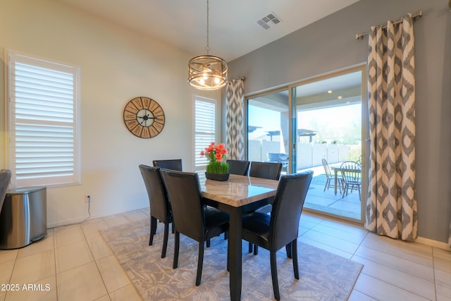 4576 W Agave Ave, Eloy, AZ 85131 - dining area with light tile patterned flooring, visible vents, and baseboards