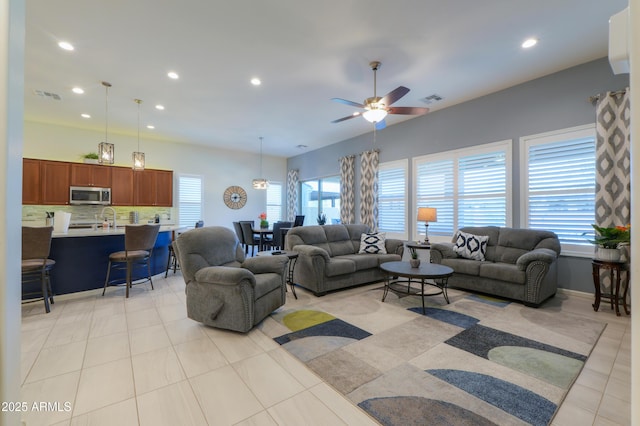 4576 W Agave Ave, Eloy, AZ 85131 - living area with light tile patterned floors, visible vents, and recessed lighting