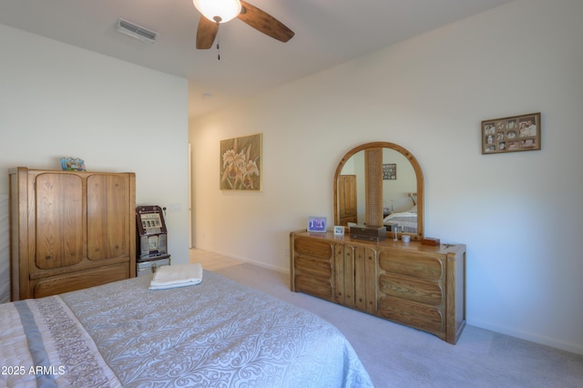 4576 W Agave Ave, Eloy, AZ 85131 - bedroom with light carpet, ceiling fan, visible vents, and baseboards