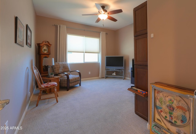 4576 W Agave Ave, Eloy, AZ 85131 - living area with light carpet, a ceiling fan, and baseboards