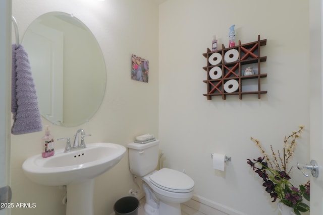 4576 W Agave Ave, Eloy, AZ 85131 - bathroom with toilet and baseboards