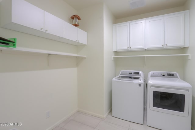 4576 W Agave Ave, Eloy, AZ 85131 - washroom with cabinet space, light tile patterned floors, baseboards, visible vents, and separate washer and dryer