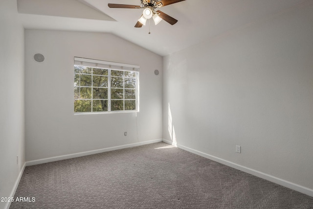 unfurnished room featuring ceiling fan, lofted ceiling, and carpet floors