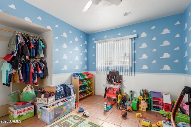 playroom featuring tile patterned floors and a ceiling fan