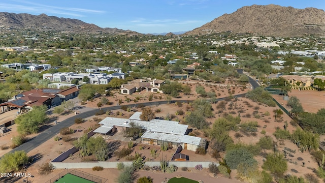 birds eye view of property featuring a mountain view