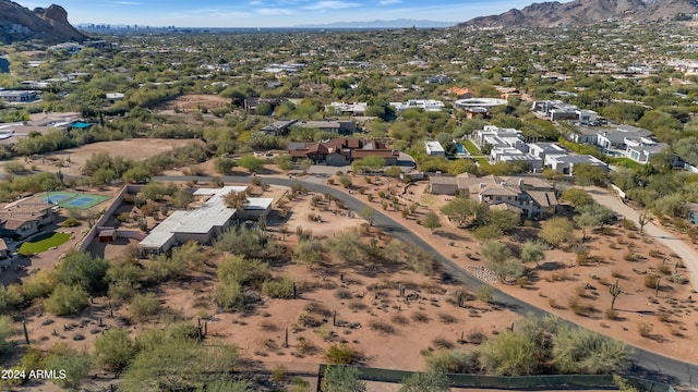 birds eye view of property featuring a mountain view