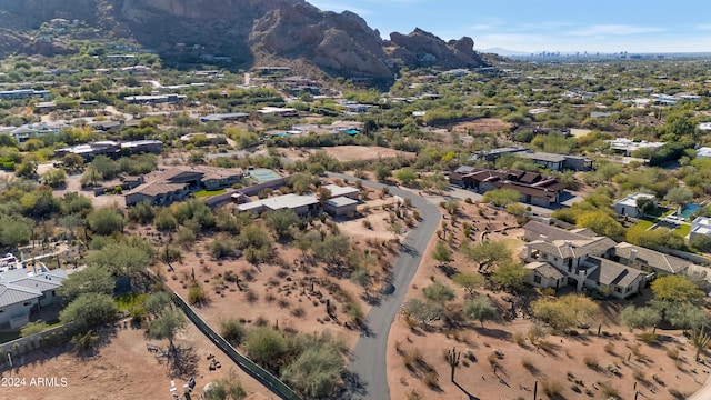 birds eye view of property featuring a mountain view