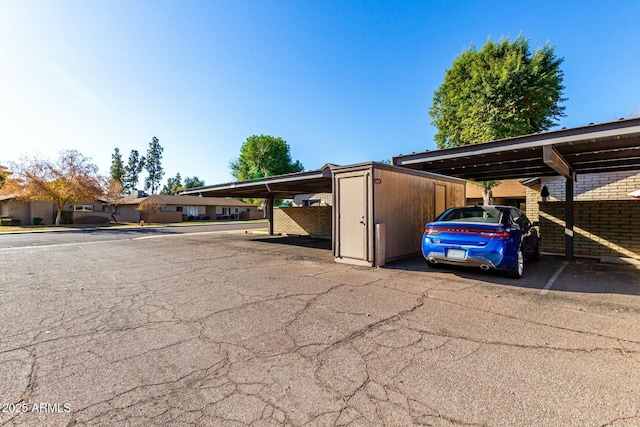 view of car parking with a carport