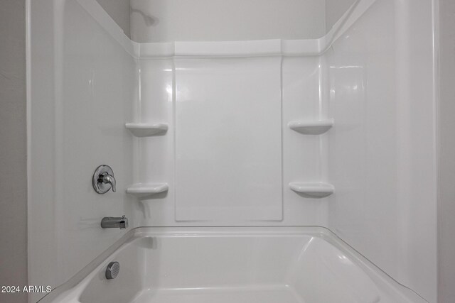 bathroom with shower / bath combination