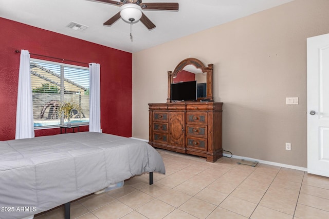 bedroom featuring ceiling fan and light tile patterned flooring