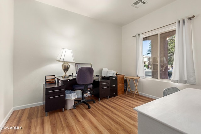 office space featuring light hardwood / wood-style flooring